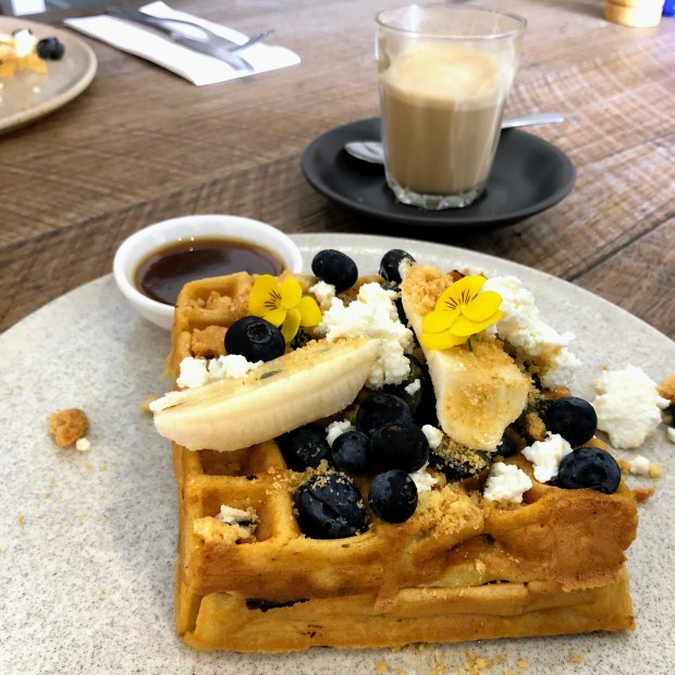 Waffles with blueberries and bananas from Millstone in Malvern, Australia