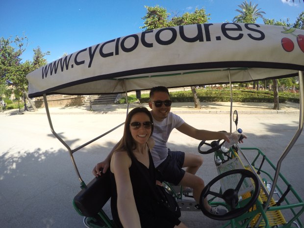 Biking through Parque de Maria Luisa in Seville, Spain